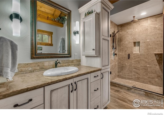 2055 Siskin Dr, Estes Park, CO 80517 - full bath with a shower stall, vanity, and wood finished floors