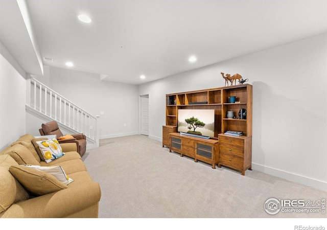 1911 Morningstar Way Unit 2, Fort Collins, CO 80524 - living area with light colored carpet, stairway, and recessed lighting