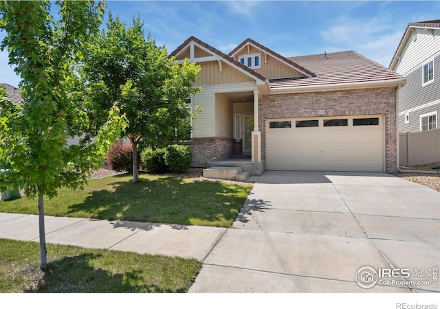 5104 Silverwood Dr, Johnstown, CO 80534 - craftsman house featuring brick siding, an attached garage, driveway, and board and batten siding