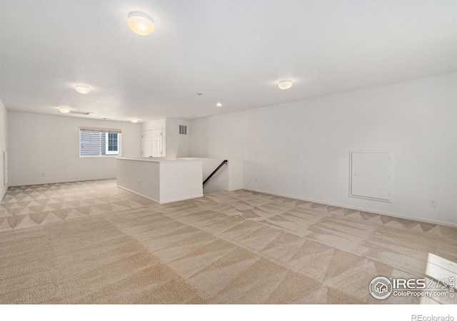 5104 Silverwood Dr, Johnstown, CO 80534 - empty room featuring light colored carpet and baseboards
