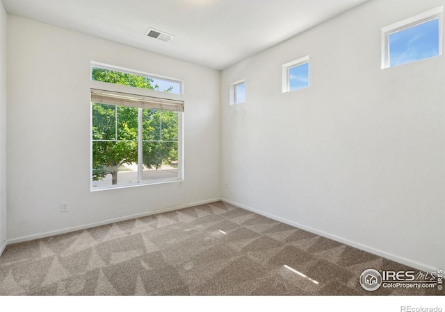5104 Silverwood Dr, Johnstown, CO 80534 - carpeted spare room featuring baseboards