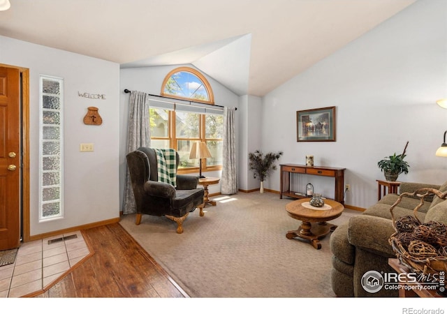 1967 Rangely Ct, Loveland, CO 80538 - living area featuring lofted ceiling and wood finished floors