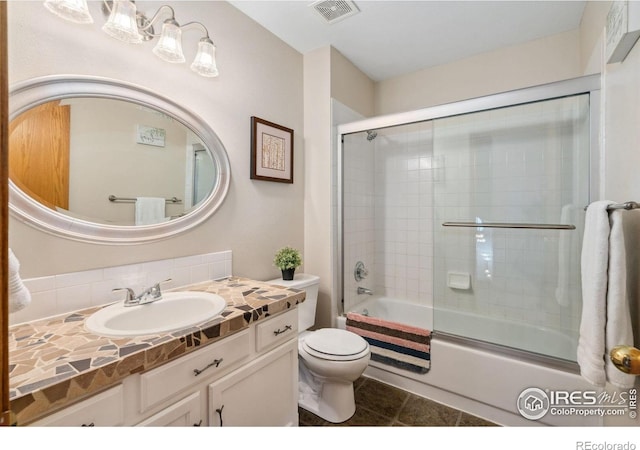 1967 Rangely Ct, Loveland, CO 80538 - bathroom with vanity, shower / bath combination with glass door, and tile patterned flooring