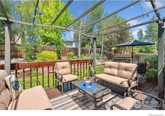 1967 Rangely Ct, Loveland, CO 80538 - deck featuring a fenced backyard and an outdoor living space