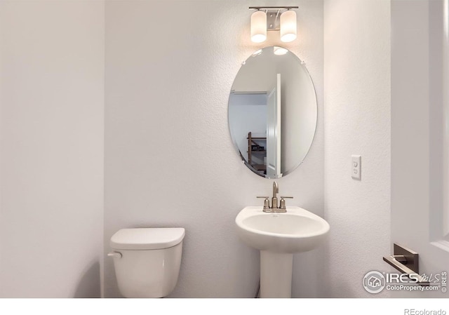 2744 Bear Springs Cir, Longmont, CO 80503 - half bathroom with toilet