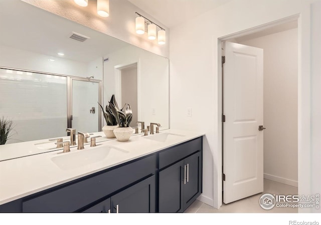 2744 Bear Springs Cir, Longmont, CO 80503 - full bathroom featuring double vanity and a shower stall