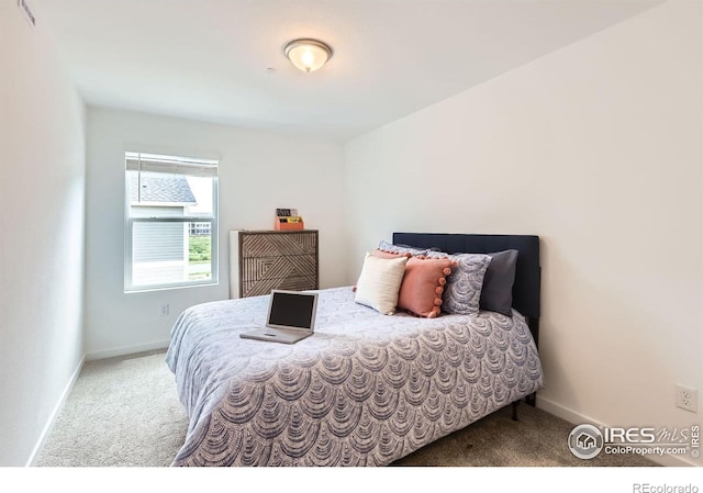 2744 Bear Springs Cir, Longmont, CO 80503 - bedroom featuring carpet flooring and baseboards