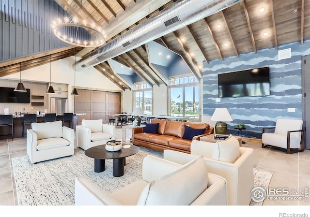 2744 Bear Springs Cir, Longmont, CO 80503 - living area with beamed ceiling, high vaulted ceiling, light tile patterned flooring, and wallpapered walls