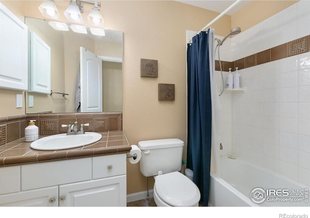 6582 Spanish Bay Dr, Windsor, CO 80550 - bathroom with vanity, shower / tub combo, and decorative backsplash