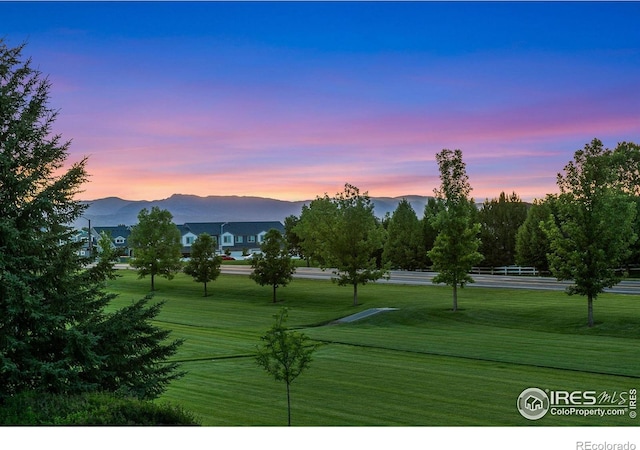 6582 Spanish Bay Dr, Windsor, CO 80550 - view of home's community with a mountain view and a yard