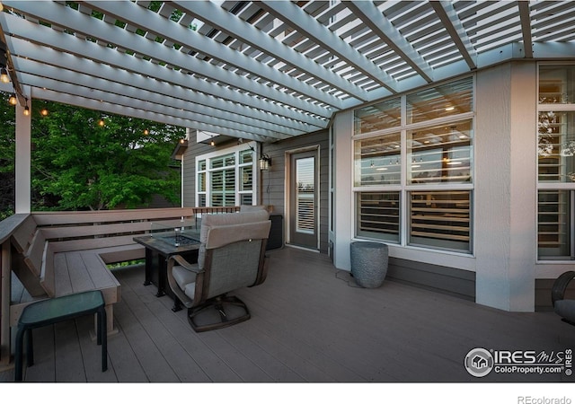 6582 Spanish Bay Dr, Windsor, CO 80550 - wooden deck with a pergola