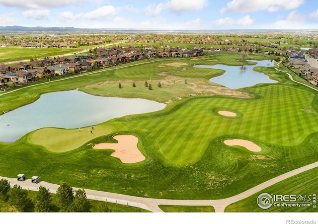 6582 Spanish Bay Dr, Windsor, CO 80550 - aerial perspective of suburban area featuring a water and mountain view and a local golf course