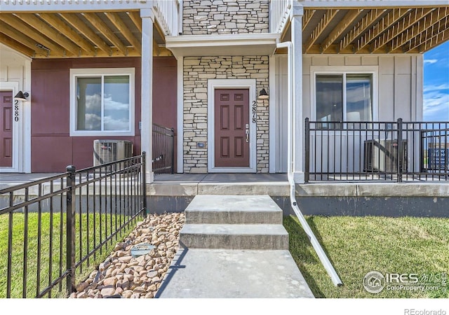 2770 Bear Springs Cir, Longmont, CO 80503 - property entrance featuring stone siding