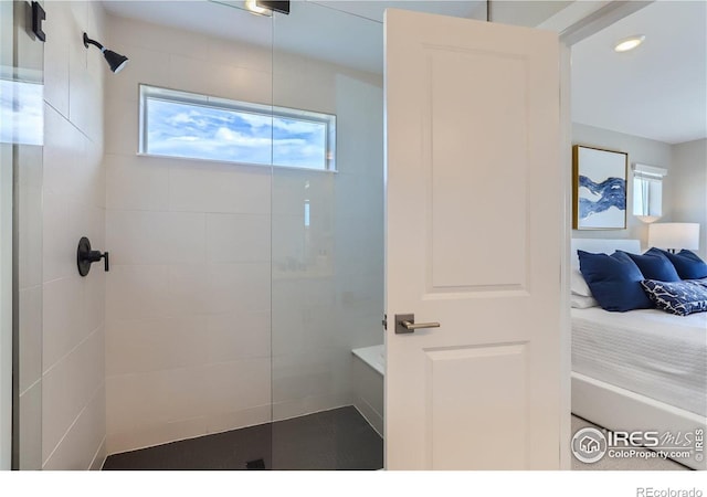 2770 Bear Springs Cir, Longmont, CO 80503 - ensuite bathroom with a walk in shower, healthy amount of natural light, and recessed lighting