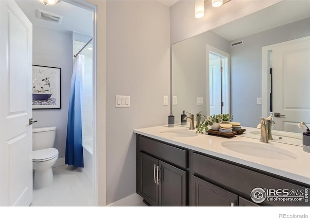 2770 Bear Springs Cir, Longmont, CO 80503 - bathroom with marble finish floors, double vanity, and shower / bathtub combination with curtain