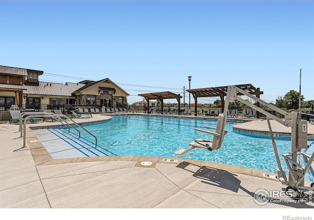 2770 Bear Springs Cir, Longmont, CO 80503 - community pool featuring a patio and a pergola