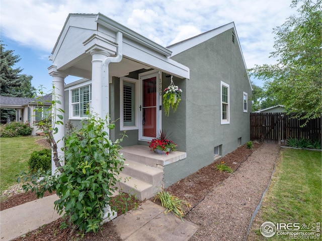 1750 Trenton St, Denver, CO 80220 - view of front facade featuring stucco siding