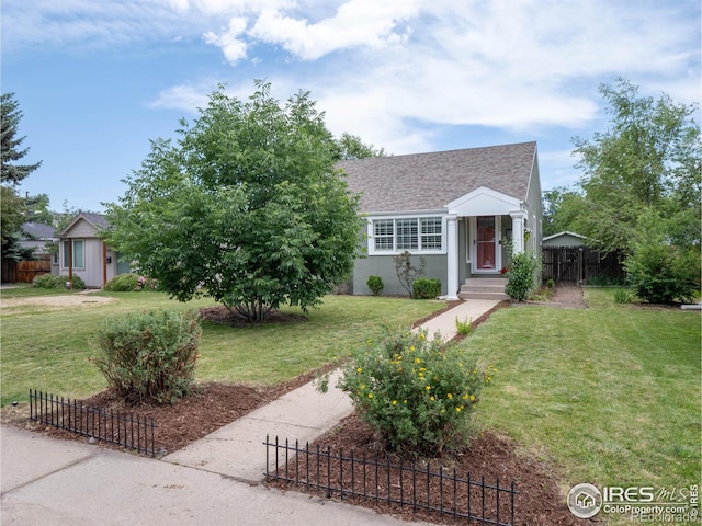 1750 Trenton St, Denver, CO 80220 - view of front of property with a shingled roof and stucco siding
