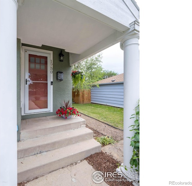 1750 Trenton St, Denver, CO 80220 - entrance to property featuring stucco siding