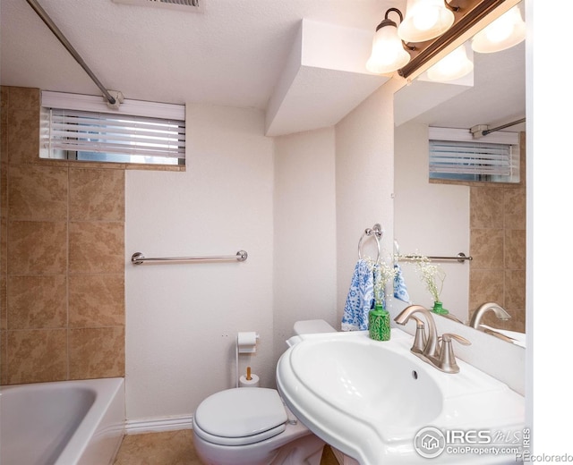 1750 Trenton St, Denver, CO 80220 - full bathroom featuring shower / bathtub combination and tile patterned floors
