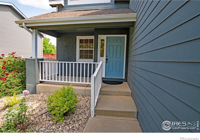 3268 White Buffalo Dr, Wellington, CO 80549 - doorway to property with covered porch
