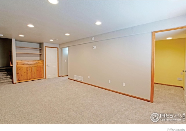 3268 White Buffalo Dr, Wellington, CO 80549 - unfurnished living room with carpet flooring and recessed lighting