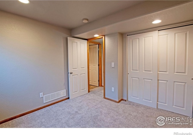 3268 White Buffalo Dr, Wellington, CO 80549 - unfurnished bedroom featuring carpet flooring, a closet, and recessed lighting