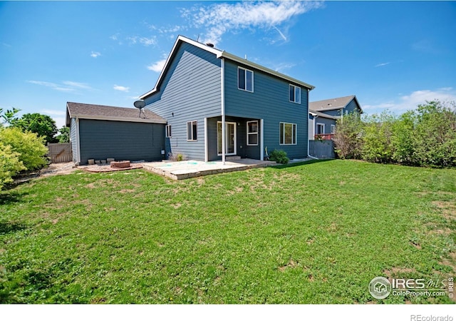 3268 White Buffalo Dr, Wellington, CO 80549 - back of house featuring a patio area