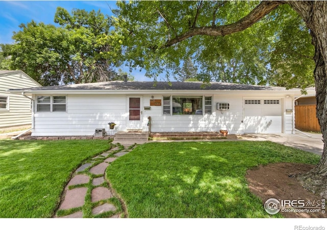 408 Riddle Dr, Fort Collins, CO 80521 - ranch-style home with an attached garage and concrete driveway
