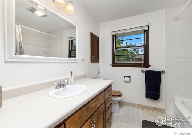 408 Riddle Dr, Fort Collins, CO 80521 - bathroom with vanity, tile patterned floors, and shower / bathtub combination with curtain
