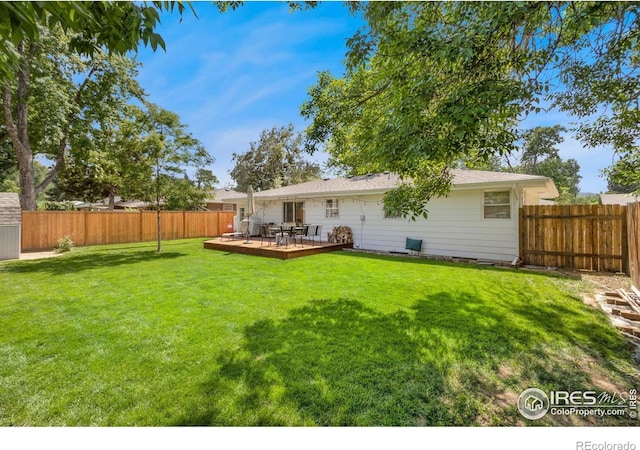 408 Riddle Dr, Fort Collins, CO 80521 - back of house with a wooden deck and a fenced backyard