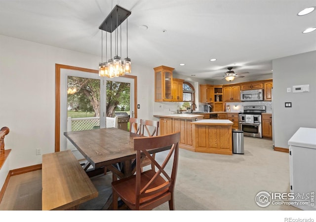 991 Peaceful View Pl, Johnstown, CO 80534 - dining room featuring recessed lighting, light carpet, and ceiling fan