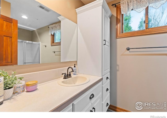 991 Peaceful View Pl, Johnstown, CO 80534 - full bath featuring vanity, a shower with shower door, and recessed lighting