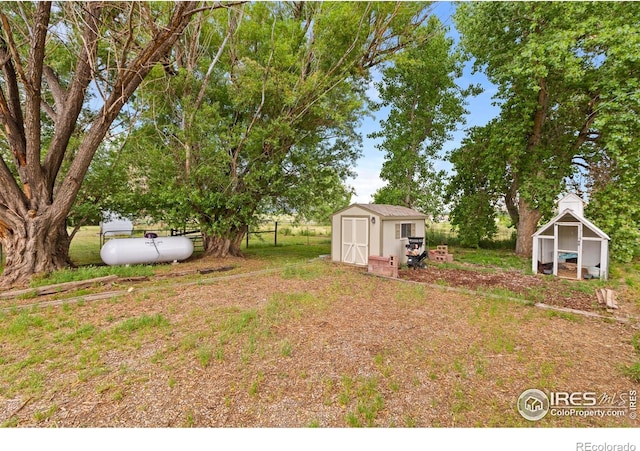 991 Peaceful View Pl, Johnstown, CO 80534 - view of yard featuring a storage shed