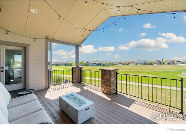5954 Black Lion Ct, Windsor, CO 80550 - deck with an outdoor fire pit, a residential view, and a yard