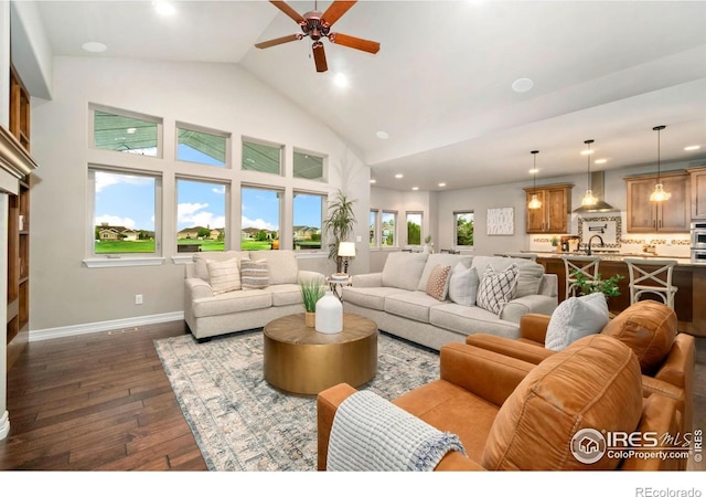 5954 Black Lion Ct, Windsor, CO 80550 - living room featuring high vaulted ceiling, dark wood-type flooring, recessed lighting, and ceiling fan