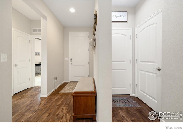 4822 Wildflower Pl, Dacono, CO 80514 - entrance foyer featuring wood finished floors and recessed lighting