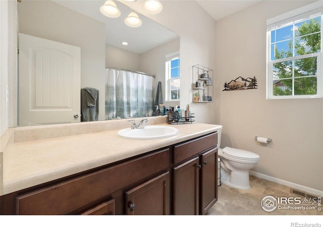 4822 Wildflower Pl, Dacono, CO 80514 - bathroom with vanity and a shower with shower curtain