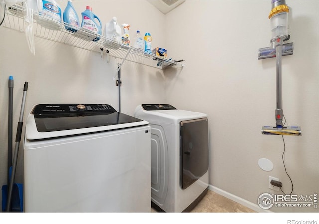 4822 Wildflower Pl, Dacono, CO 80514 - laundry area featuring independent washer and dryer and baseboards