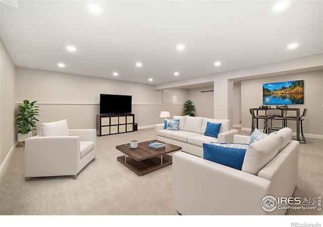 4822 Wildflower Pl, Dacono, CO 80514 - carpeted living area featuring baseboards and recessed lighting