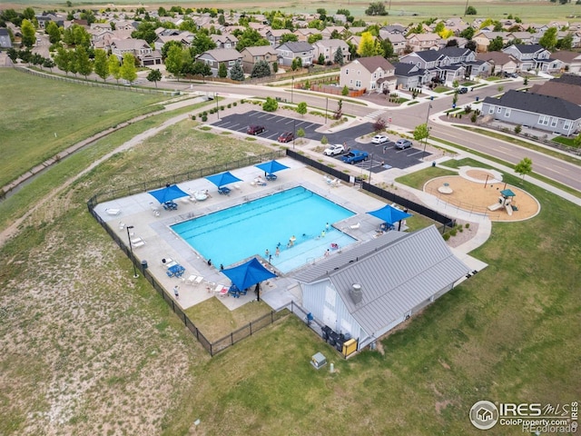 4822 Wildflower Pl, Dacono, CO 80514 - aerial perspective of suburban area featuring a pool area