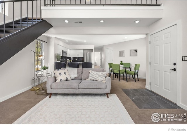 5904 Gunbarrel Ave Unit B, Boulder, CO 80301 - living room featuring dark carpet, recessed lighting, and stairway