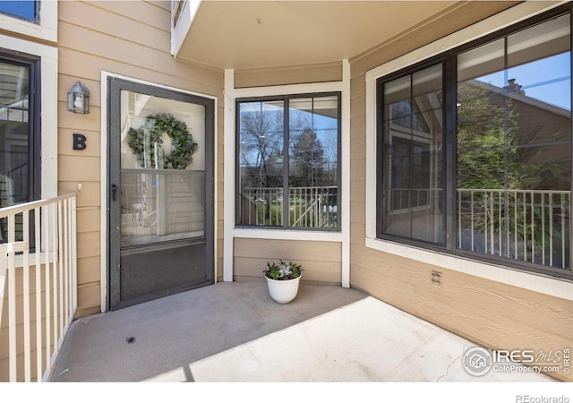 5904 Gunbarrel Ave Unit B, Boulder, CO 80301 - view of exterior entry with a porch