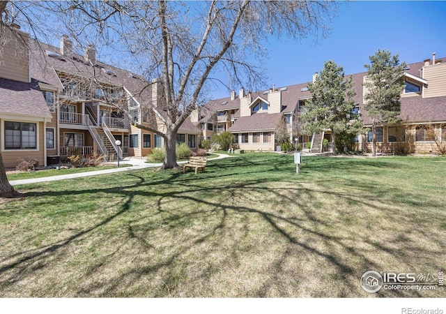 5904 Gunbarrel Ave Unit B, Boulder, CO 80301 - view of home's community featuring a residential view, stairs, and a lawn