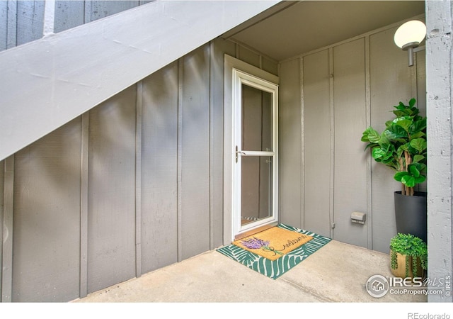 801 E Drake Rd Unit G77, Fort Collins, CO 80525 - doorway to property featuring board and batten siding