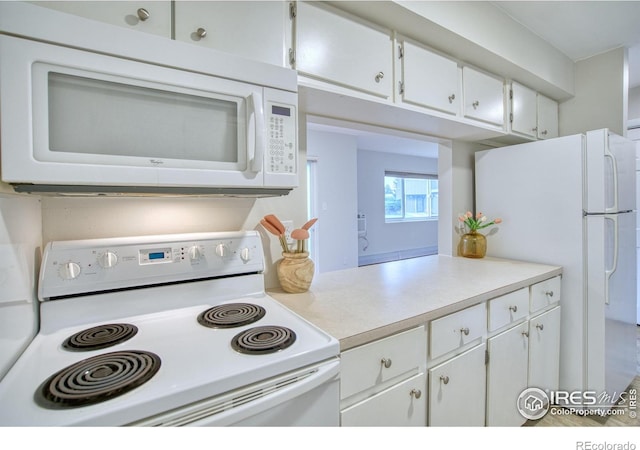 801 E Drake Rd Unit G77, Fort Collins, CO 80525 - kitchen with white appliances, white cabinets, and light countertops