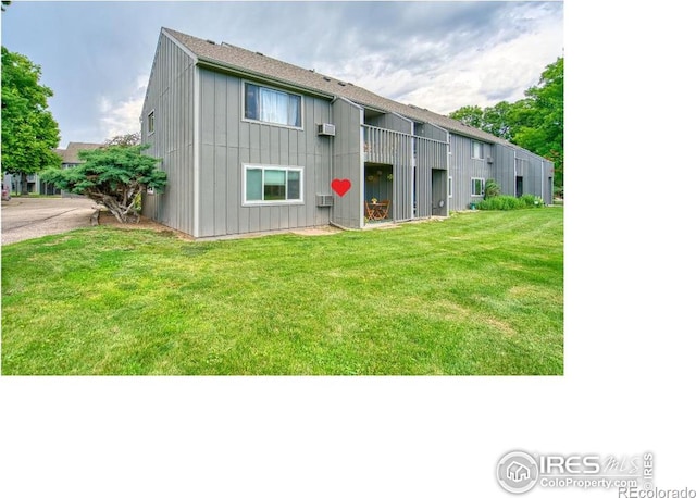 801 E Drake Rd Unit G77, Fort Collins, CO 80525 - back of house with a lawn