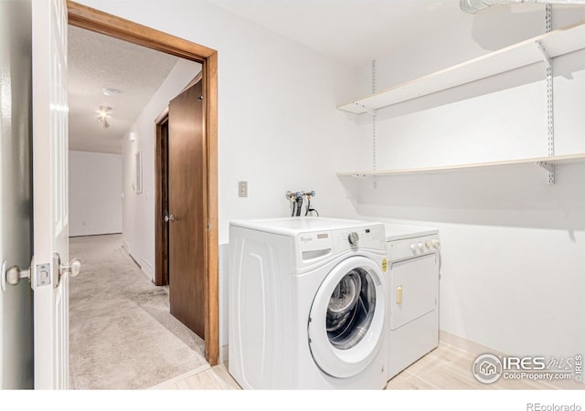 1410 Bacchus Dr Unit B12, Lafayette, CO 80026 - laundry area featuring washing machine and dryer and light carpet