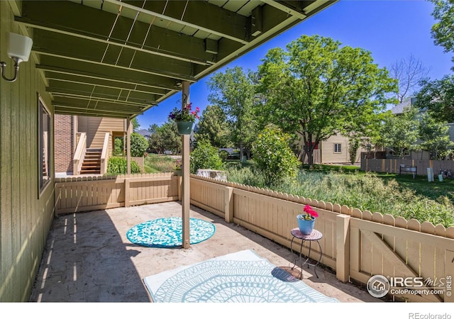 1410 Bacchus Dr Unit B12, Lafayette, CO 80026 - view of patio / terrace featuring stairs