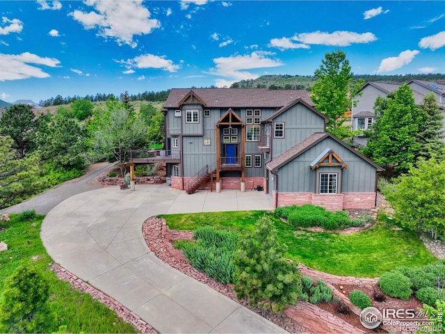 385 Vasquez Ct, Lyons, CO 80540 - view of front facade featuring board and batten siding and stone siding
